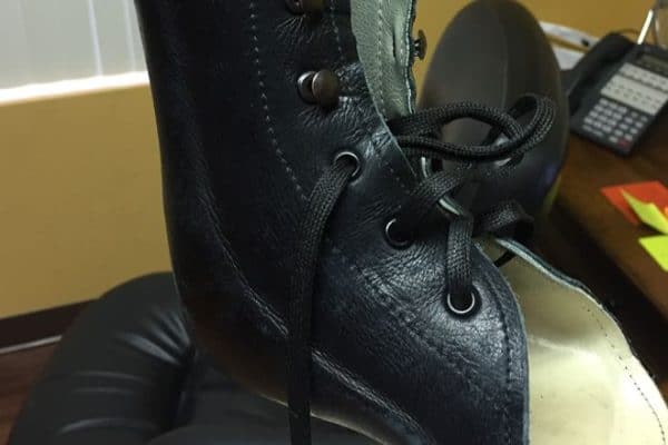 A Close-Up View Of A Black Object With Laces Inside Of It. | Evolve Prosthetics &Amp; Orthotics A Close-Up View Of A Black Object With Laces Inside Of It.